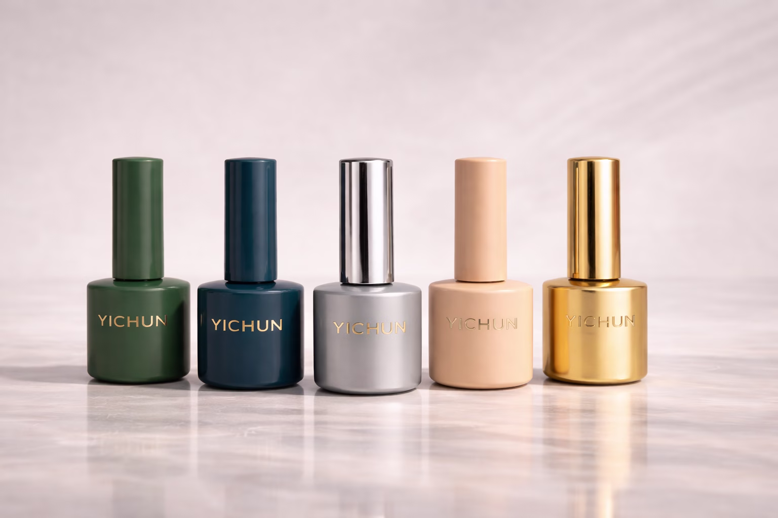 YICHUN Tropical Gel Polish Bottle Lineup Five YICHUN opaque gel polish bottles in matte, glossy, silver, gold, and tropical color finishes displayed in a premium beauty product lineup