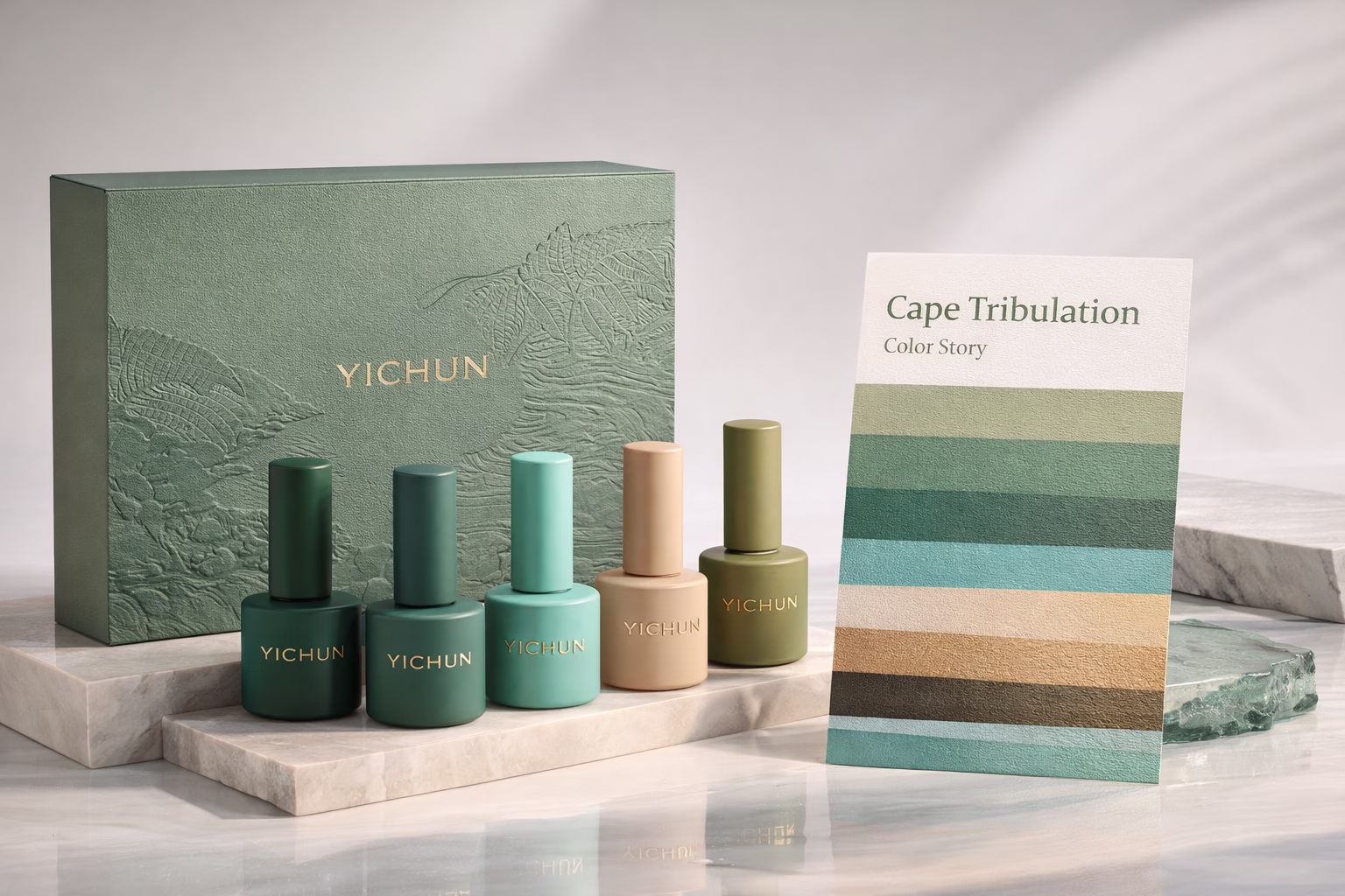 YICHUN Cape Tribulation Gel Polish Collection YICHUN gel polish collection inspired by Cape Tribulation featuring matte embossed packaging box, opaque bottles in tropical green and ocean tones, and a layered color palette card